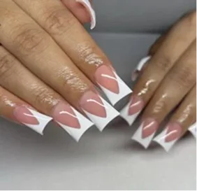 A sophisticated combination of refined colors and contemporary details creates a polished manicure made for modern luxury.