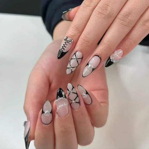 Classic French tips are elevated with a pearlescent finish, blending timeless elegance with a modern glow.